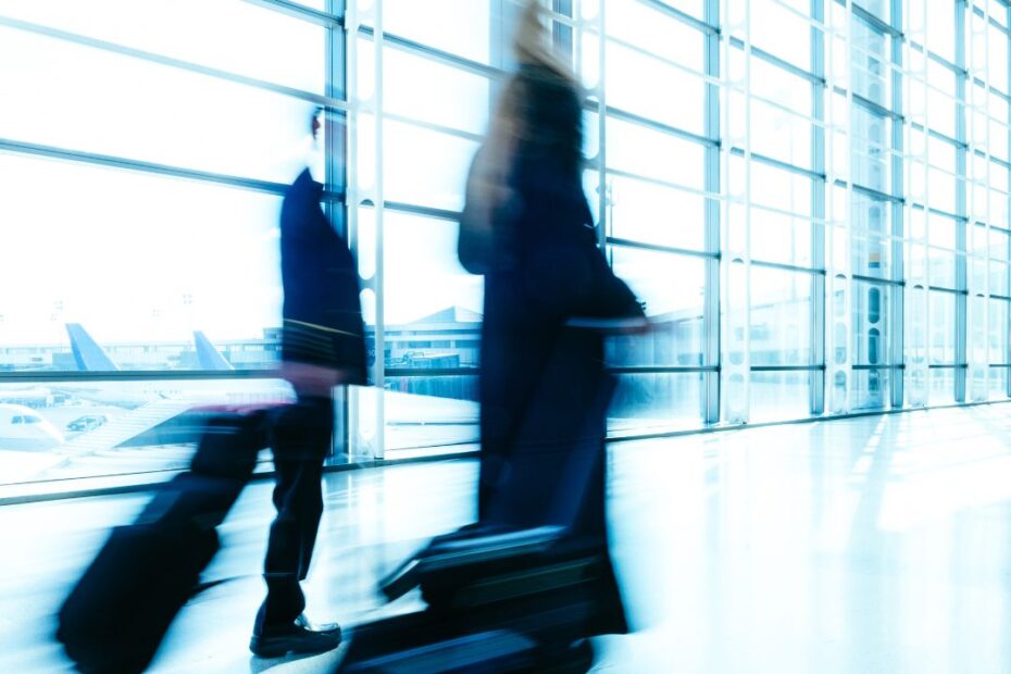 Business people walking through an airport