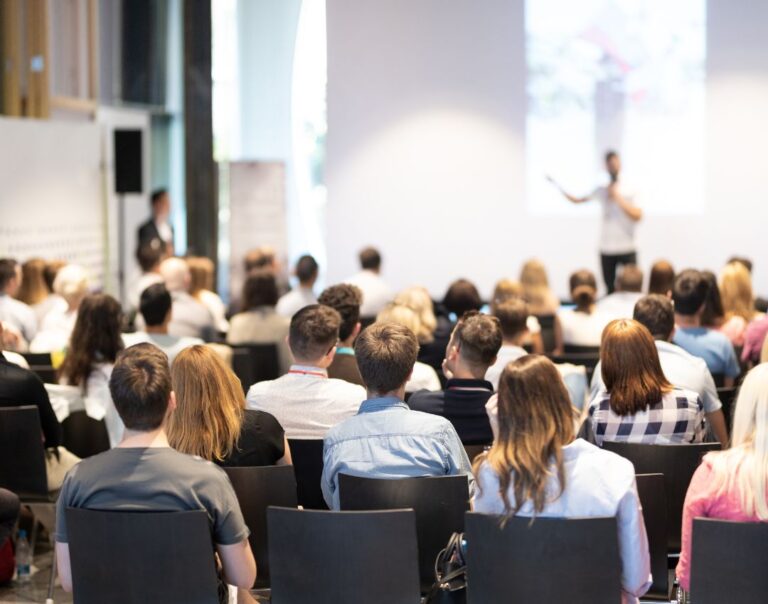 Conference event with audience and speaker
