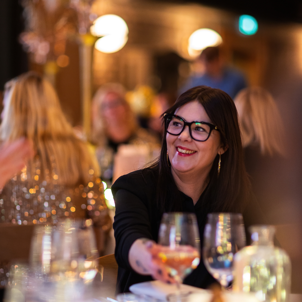 Smiling guest at a Reed & Mackay event