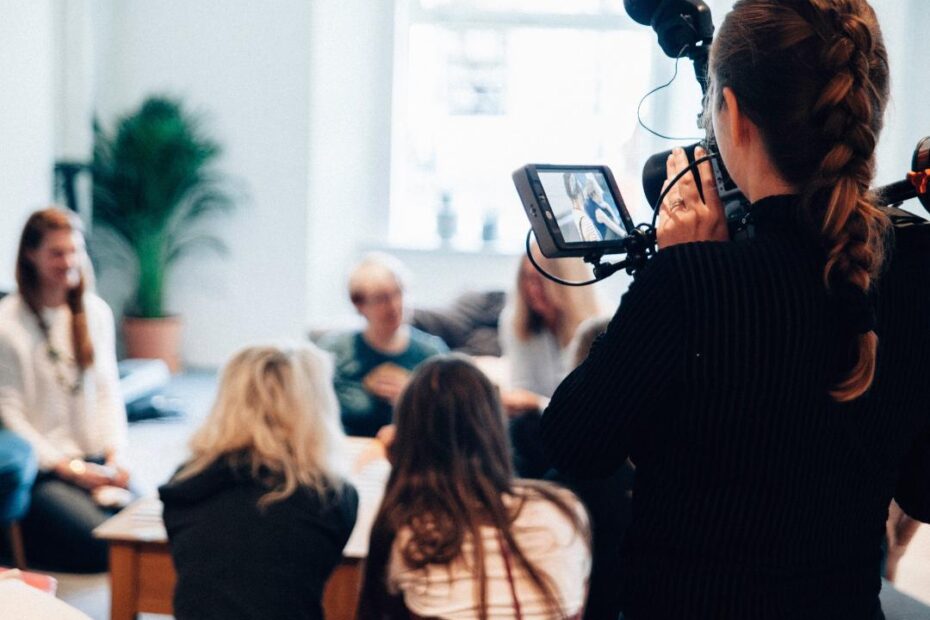 Woman filming an event
