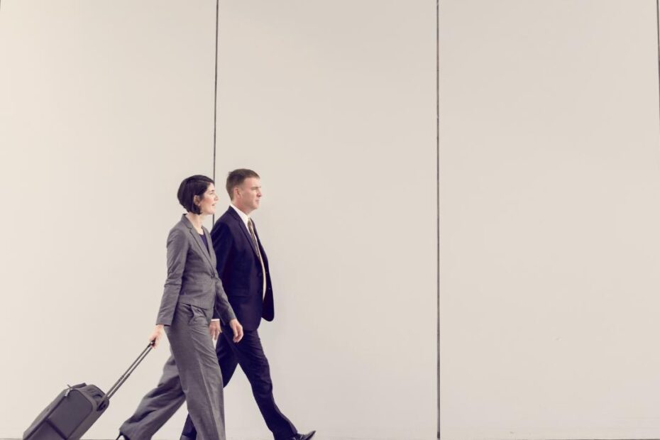 Business travellers walking through an airport