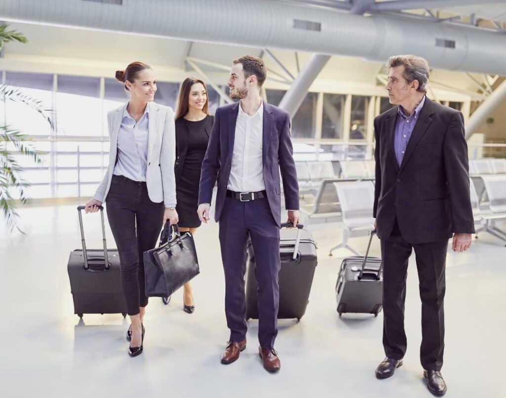 Business travellers walking through the airport