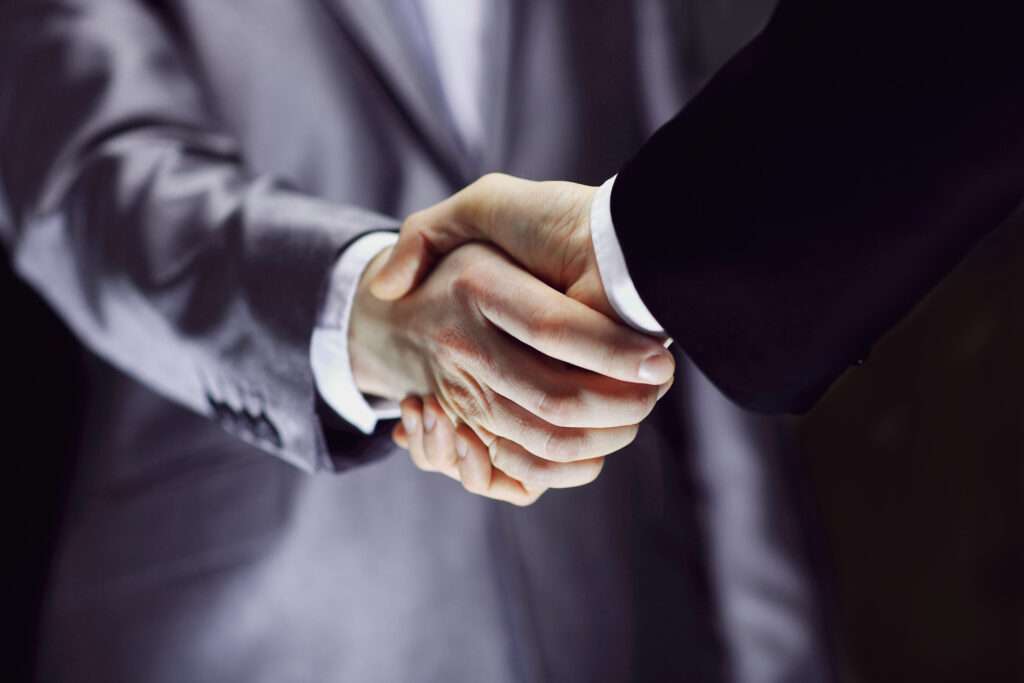 Shaking hands in partnership