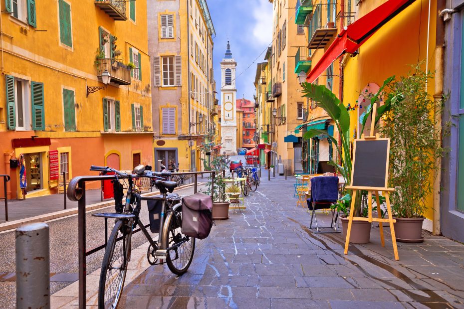 Nice colorful street architecture and church view, tourist destination of French riviera, Alpes Maritimes depatment of France